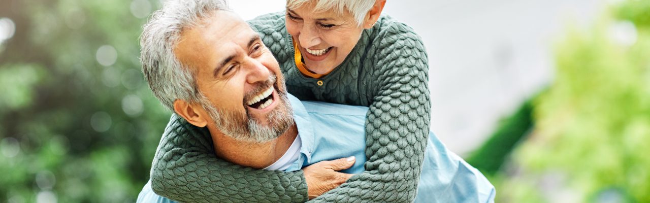 Happy active senior couple outdoors